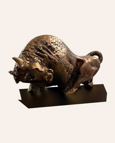 Bronze sculpture of a bull on a marble base