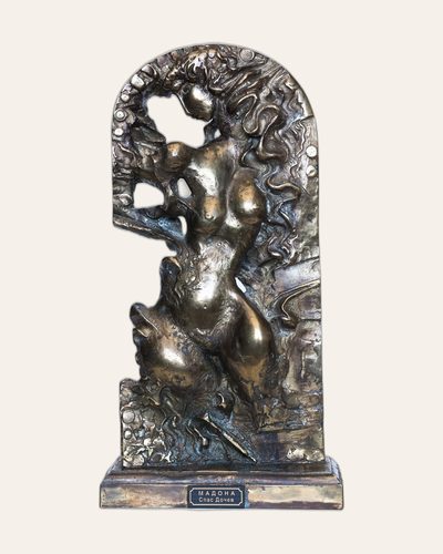 Bronze relief with a human figure inside an arched form