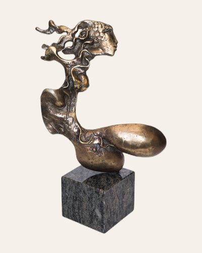 Bronze profile head with a moonlike form on a stone base